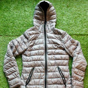 Women's XS Silver Puffer Coat with a Hood.